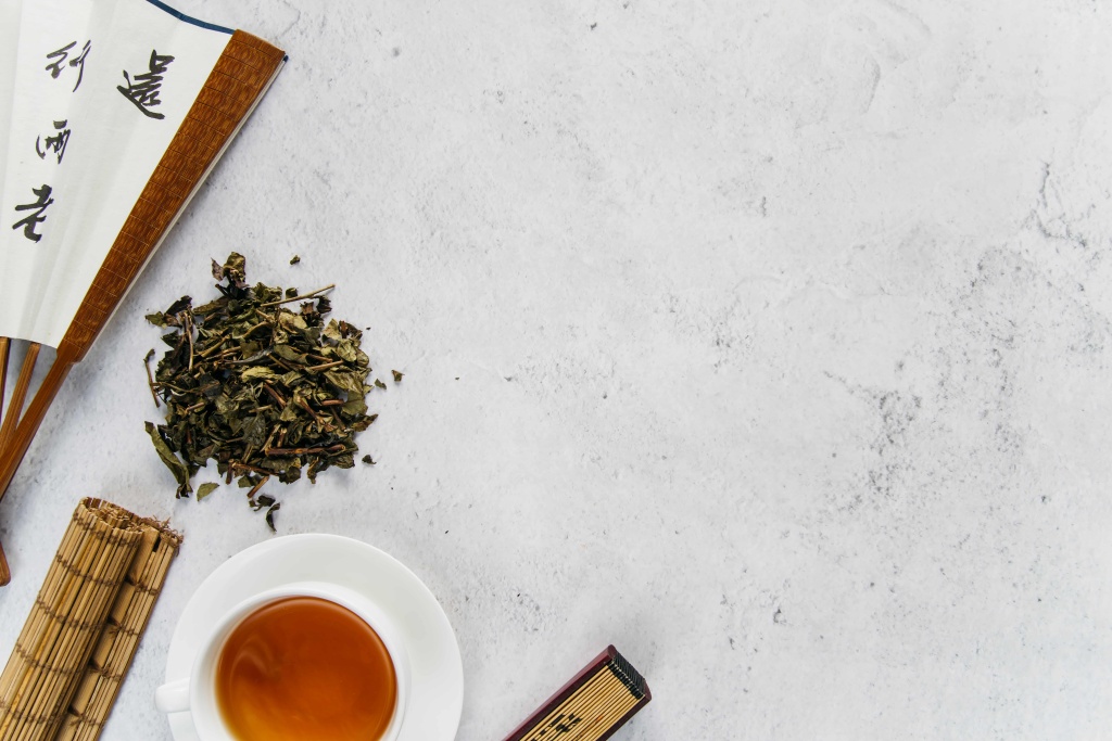 traditional-asian-fan-with-herbal-tea-rolled-up-placemat-concrete-backdrop (1).jpg traditional-asian-fan-with-herbal-tea-rolled-up-placemat-concrete-backdrop (1).jpg